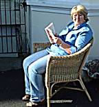Carol Wilson in a deck chair.
