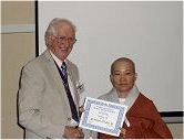 Korean nun receives her certificate.