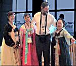 Dave Watterson greeted by Korean ladies in traditional costume.