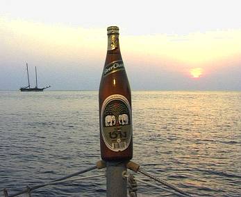 Sunset and a beer bottle.